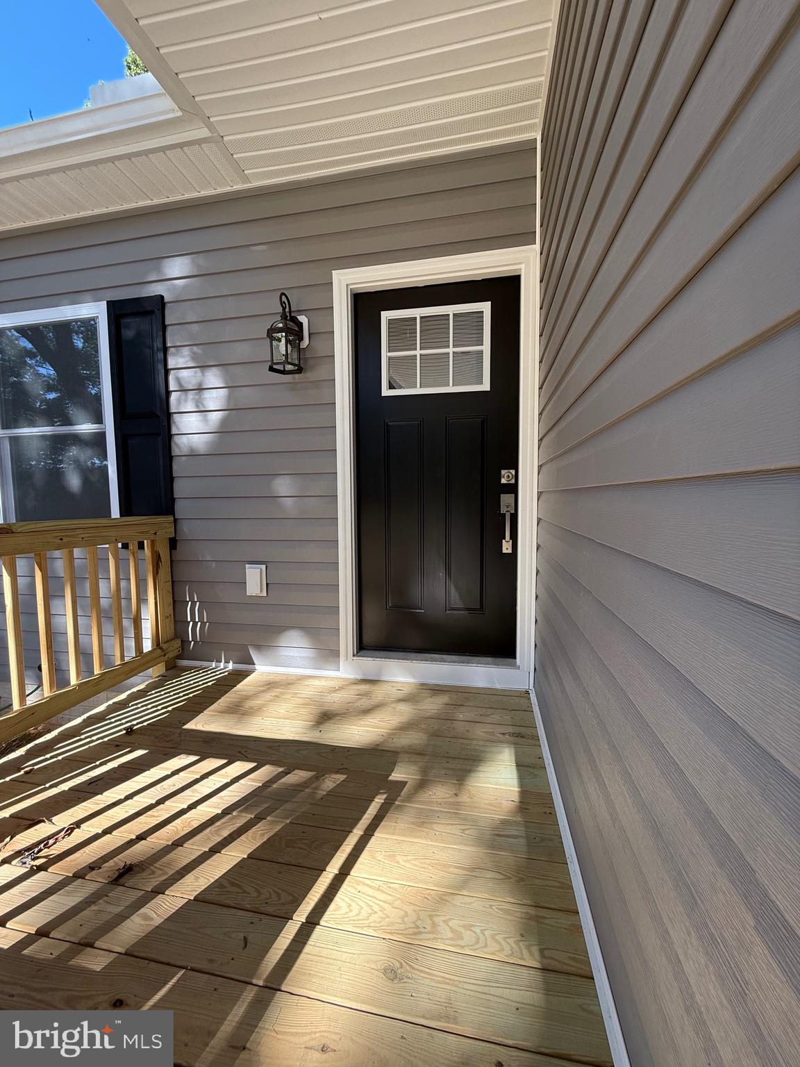 228 Dale Drive Colonial Beach, VA 22443 - Photo 32 of 59 a view of a house with a door and wooden floor