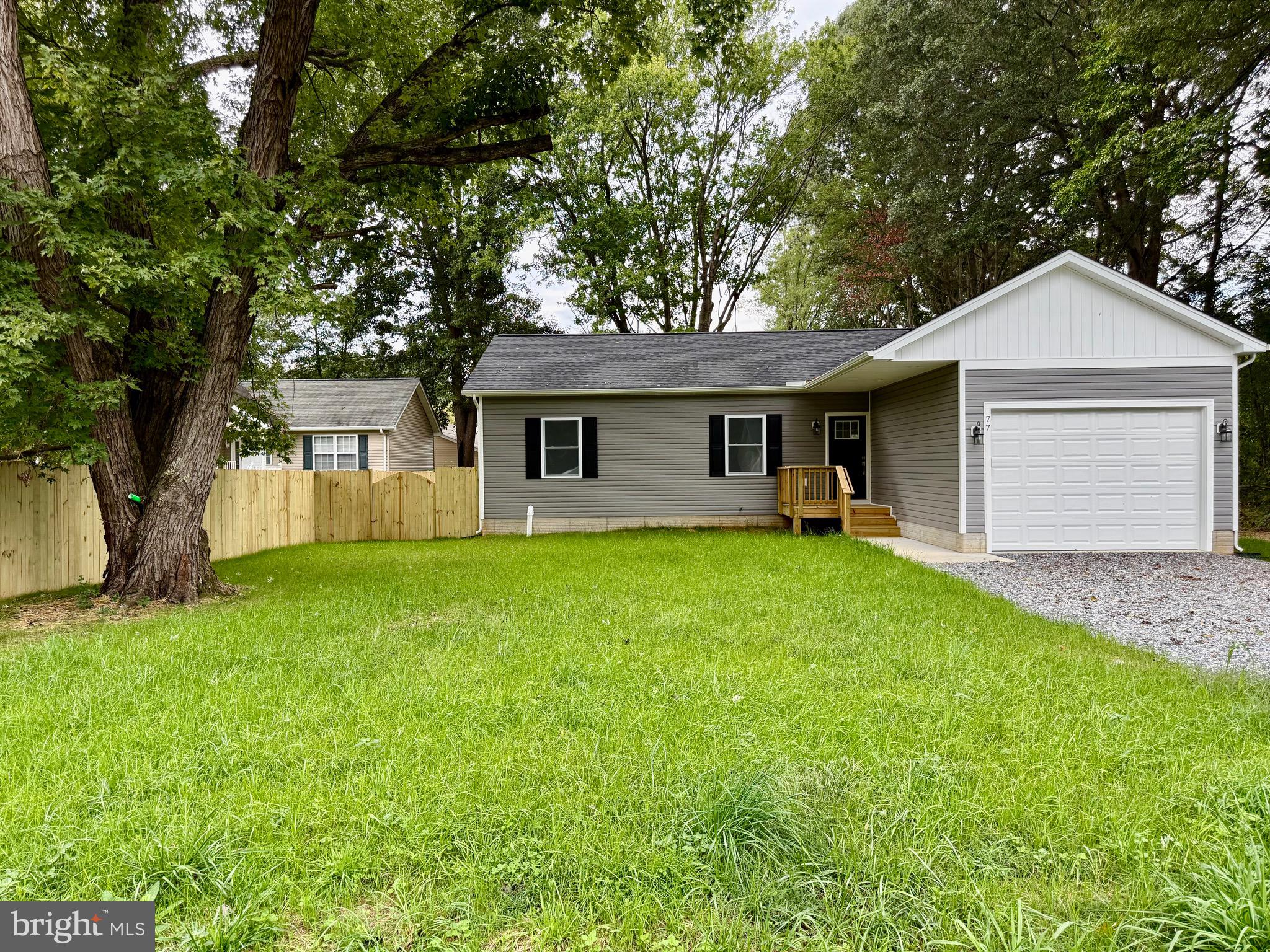 228 Dale Drive Colonial Beach, VA 22443 - Photo 4 of 59 a front view of house with yard and green space