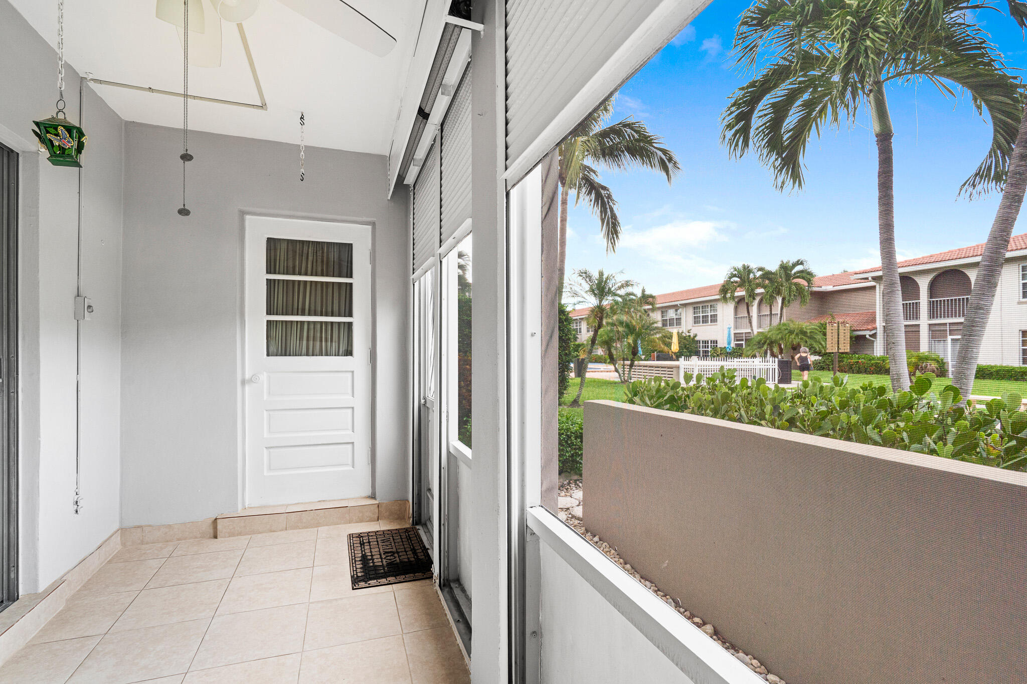 250 Northeast 20th Street, Unit 1290 Boca Raton, FL 33431 - Photo 27 of 41 a view of a balcony with potted plants