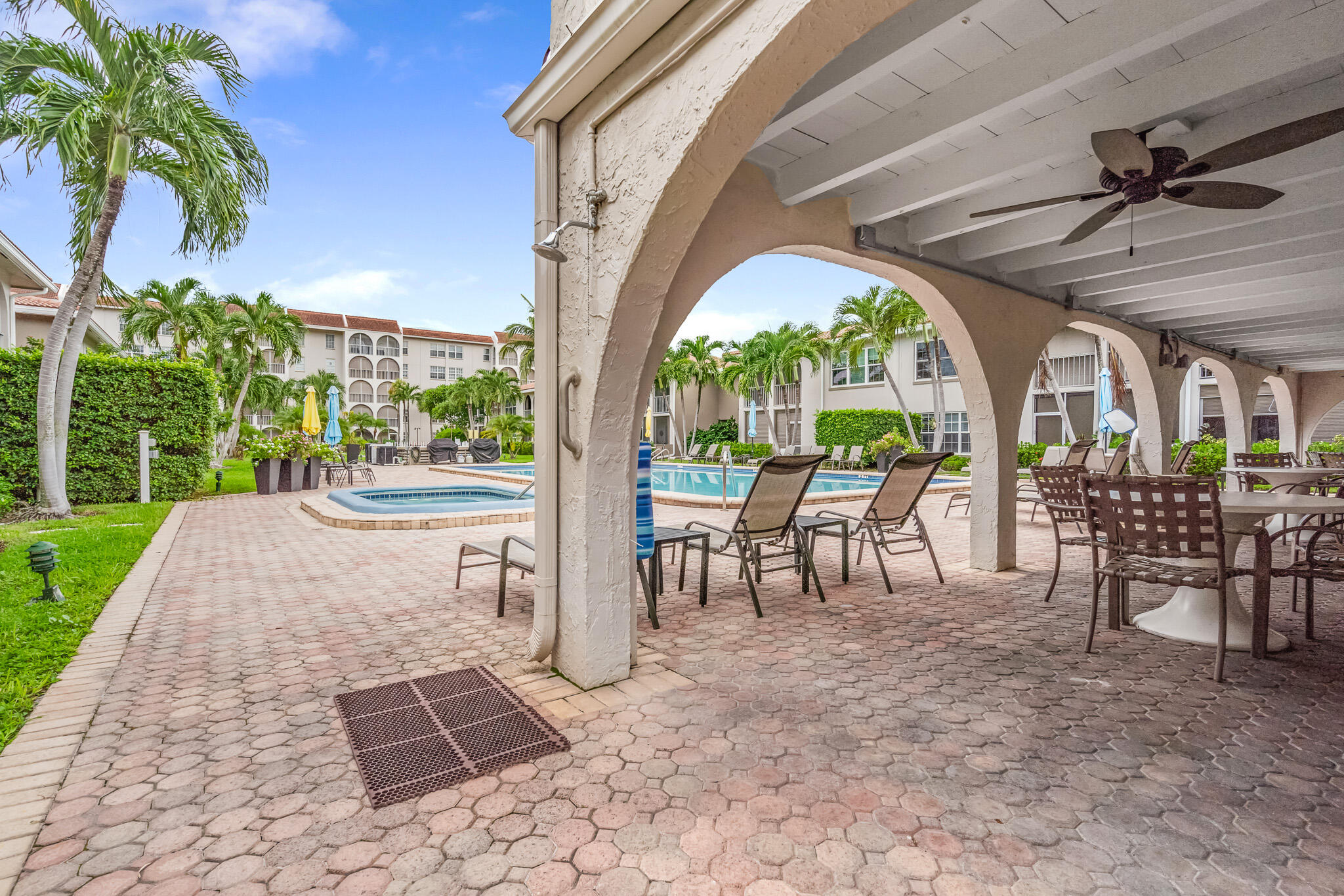 250 Northeast 20th Street, Unit 1290 Boca Raton, FL 33431 - Photo 30 of 41 a view of a porch with chairs and backyard