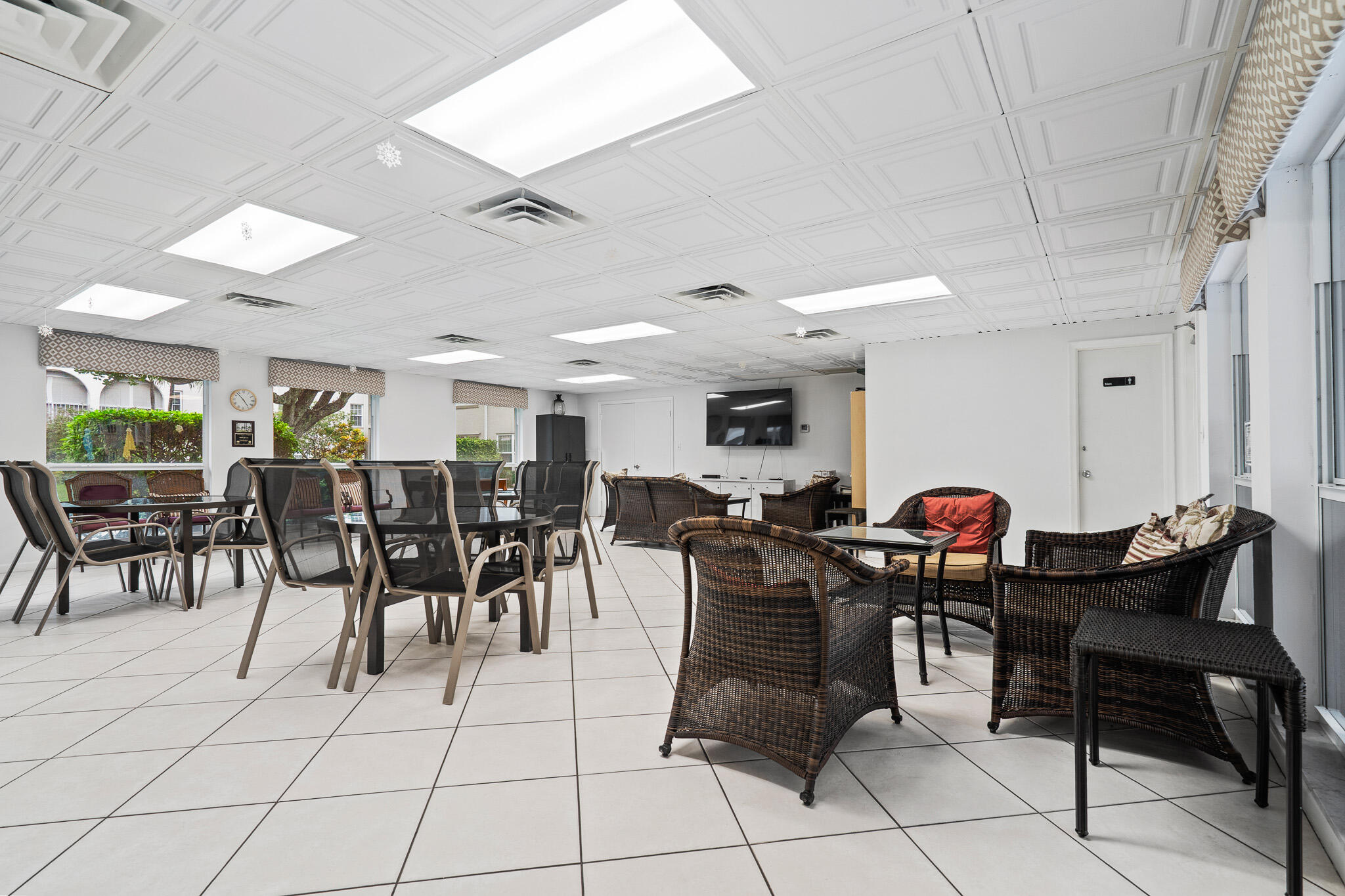 250 Northeast 20th Street, Unit 1290 Boca Raton, FL 33431 - Photo 31 of 41 a view of a dining hall with lots of tables and chairs