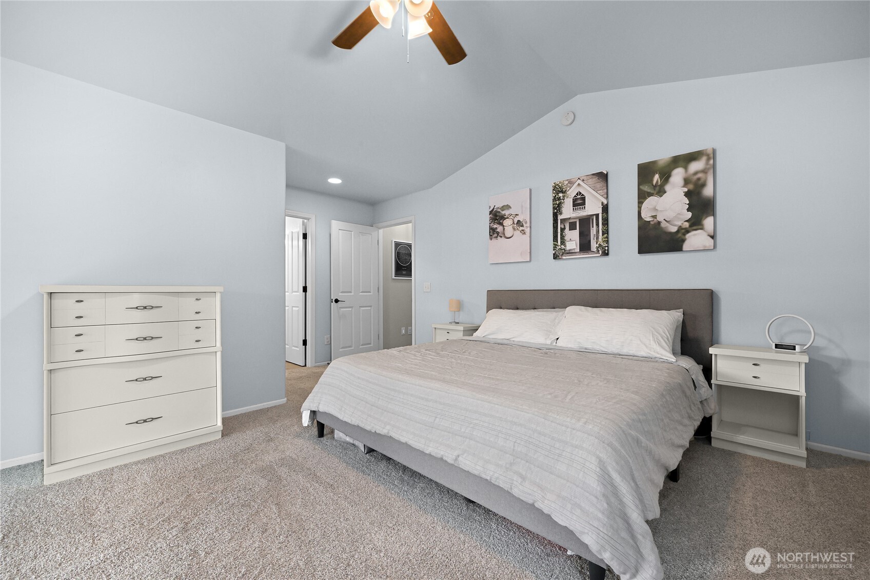 405 Jackson Court Nooksack, WA 98276 - Photo 13 of 28 a spacious bedroom with a bed and a ceiling fan