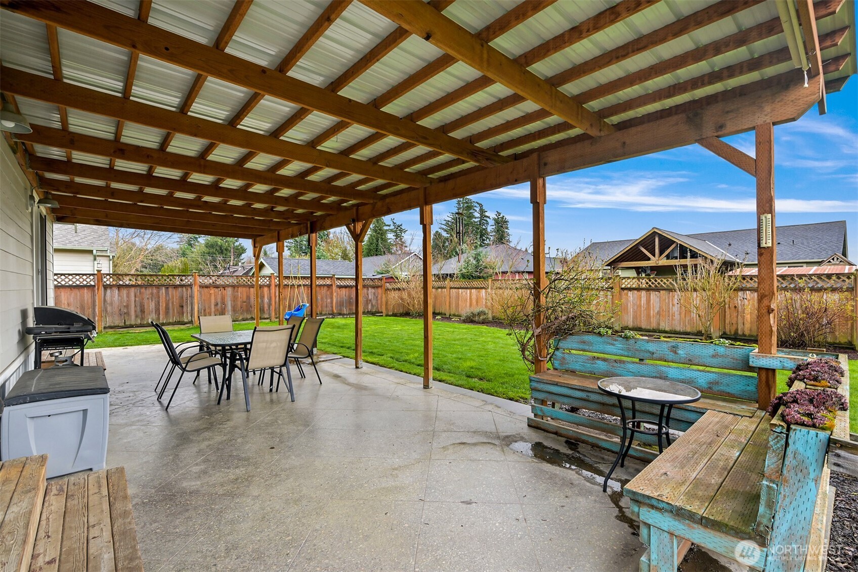 405 Jackson Court Nooksack, WA 98276 - Photo 20 of 28 a view of a chairs and table in patio with a wooden fence