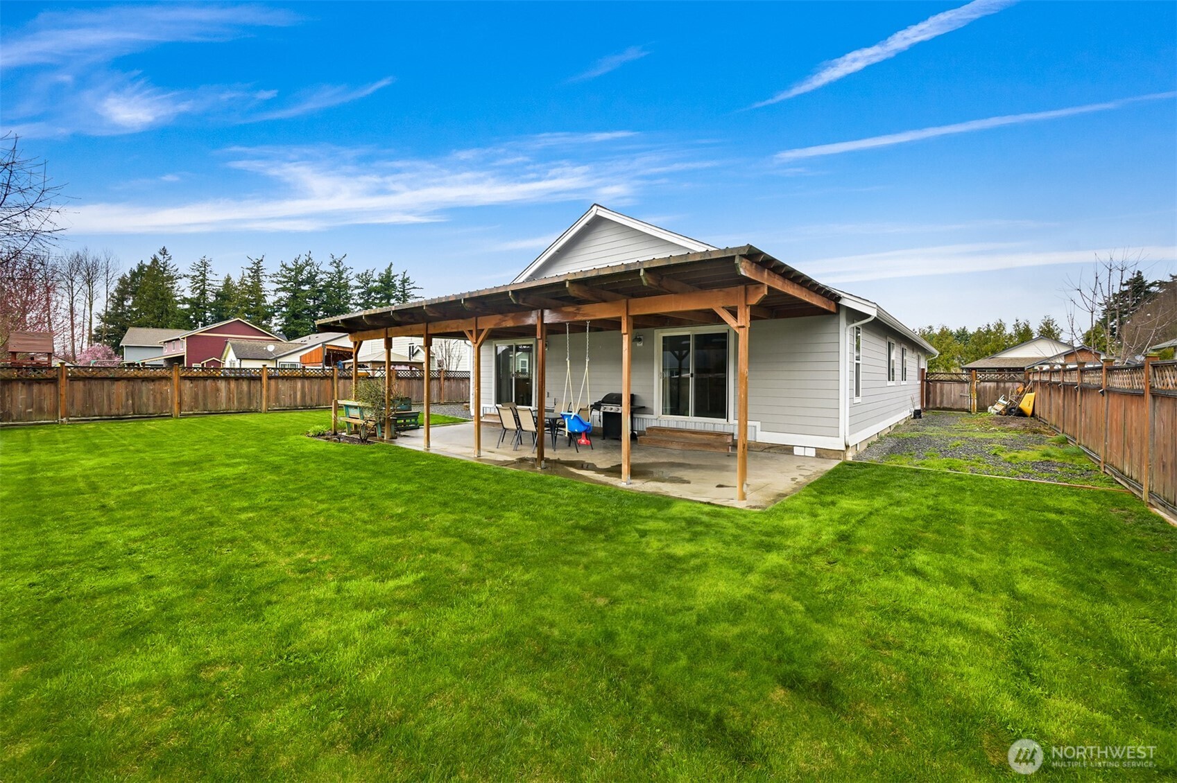 405 Jackson Court Nooksack, WA 98276 - Photo 22 of 28 a view of a house with a yard