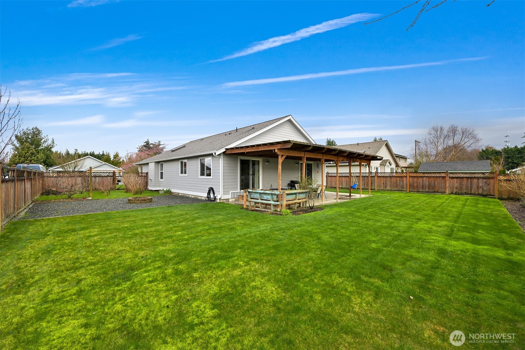 405 Jackson Court Nooksack, WA 98276 - Photo 24 of 28 a view of a house with backyard and garden