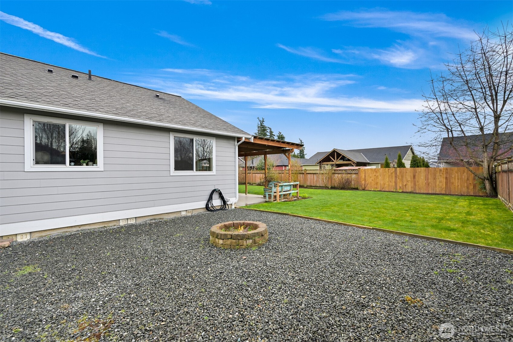 405 Jackson Court Nooksack, WA 98276 - Photo 27 of 28 a house view with a backyard space