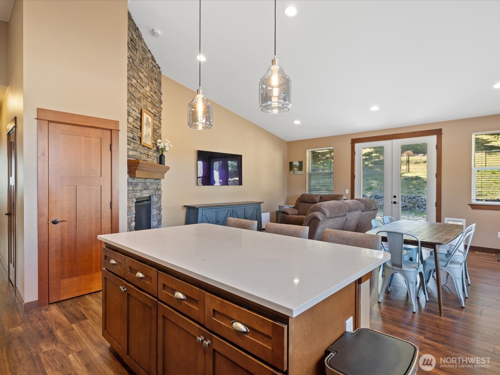 606 288th Street East Roy, WA 98580 - Photo 11 of 37 a living room with furniture a large window and wooden floor