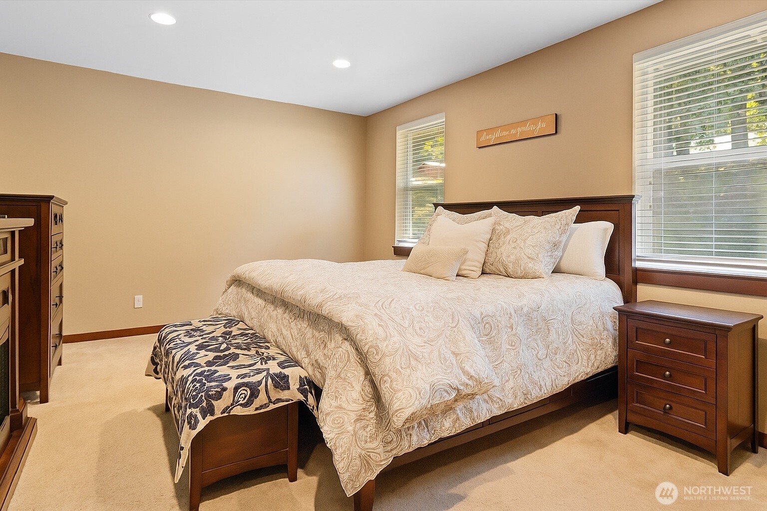 606 288th Street East Roy, WA 98580 - Photo 20 of 37 a bedroom with a bed and a flat tv screen on dresser