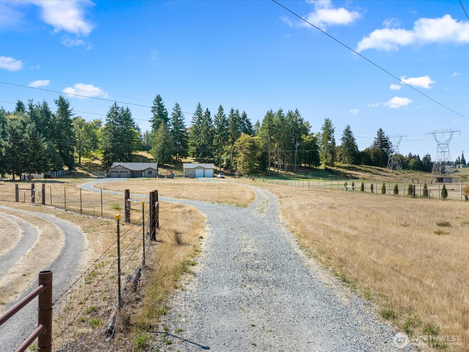 606 288th Street East Roy, WA 98580 - Photo 2 of 37 a view of an outdoor space and a yard
