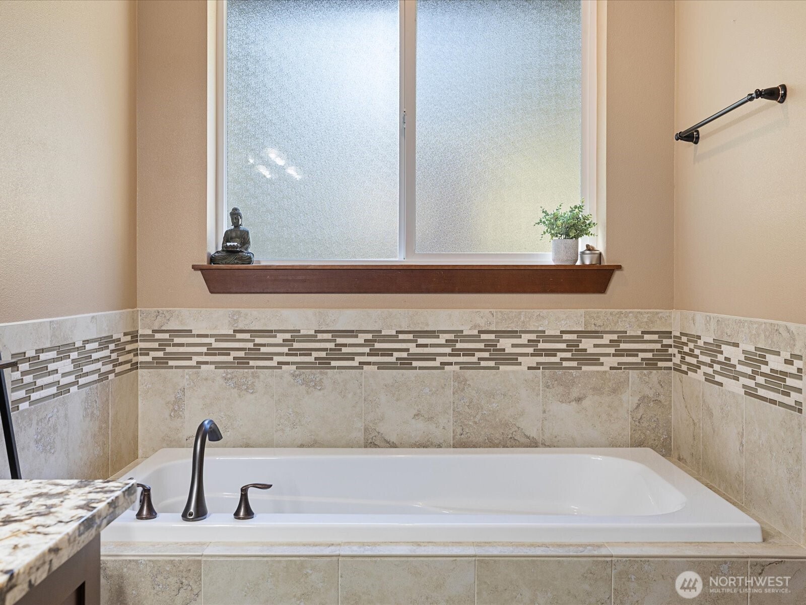 606 288th Street East Roy, WA 98580 - Photo 22 of 37 a bathroom with a granite countertop sink and a mirror
