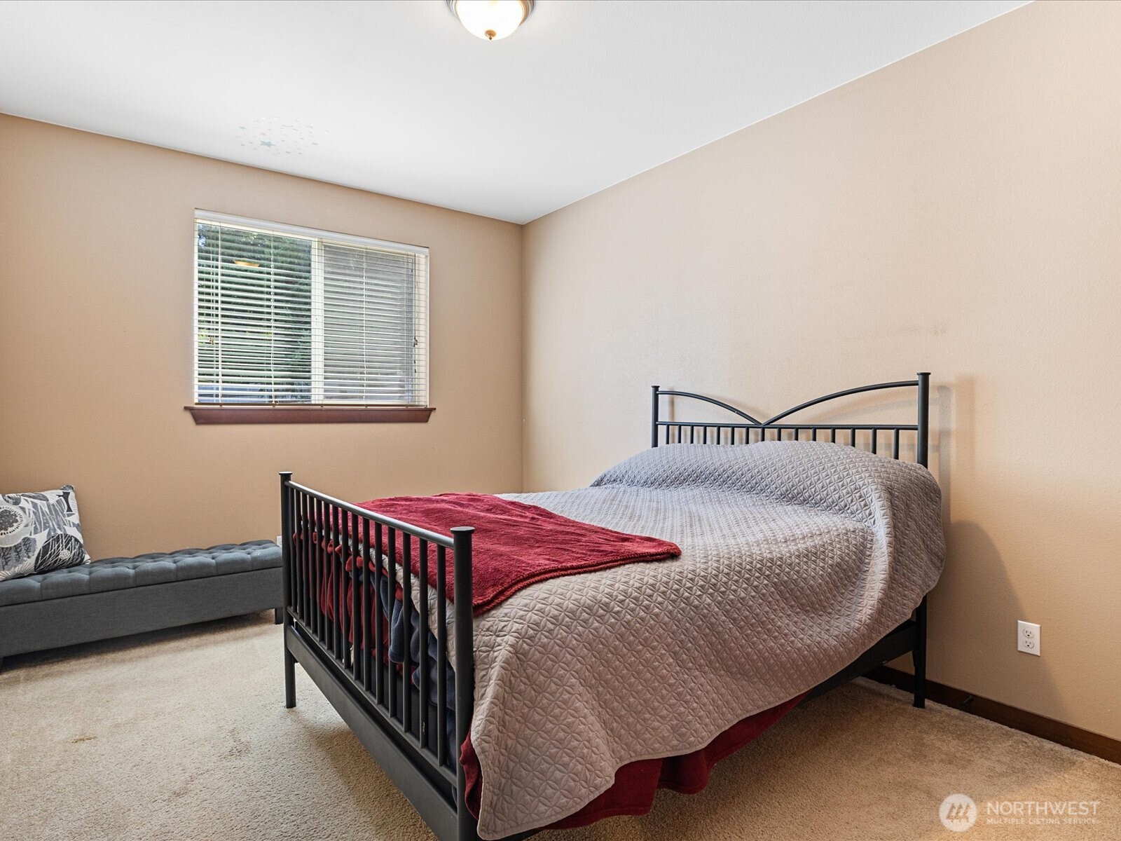 606 288th Street East Roy, WA 98580 - Photo 24 of 37 a bedroom with a bed and window