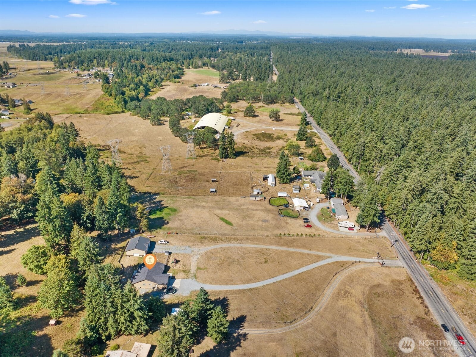 606 288th Street East Roy, WA 98580 - Photo 34 of 37 a view of a lake with a city