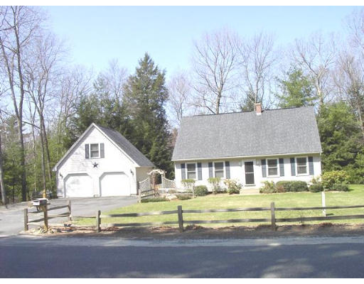 49 Upper Hampden Road Monson, MA 01057 - Photo 2 of 16 a front view of a house with a yard