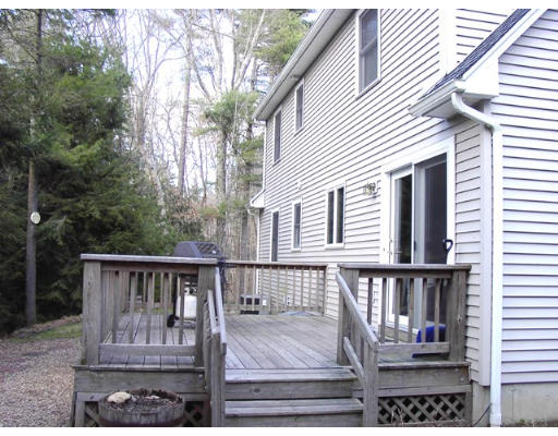 49 Upper Hampden Road Monson, MA 01057 - Photo 3 of 16 a view of a wooden deck and a backyard