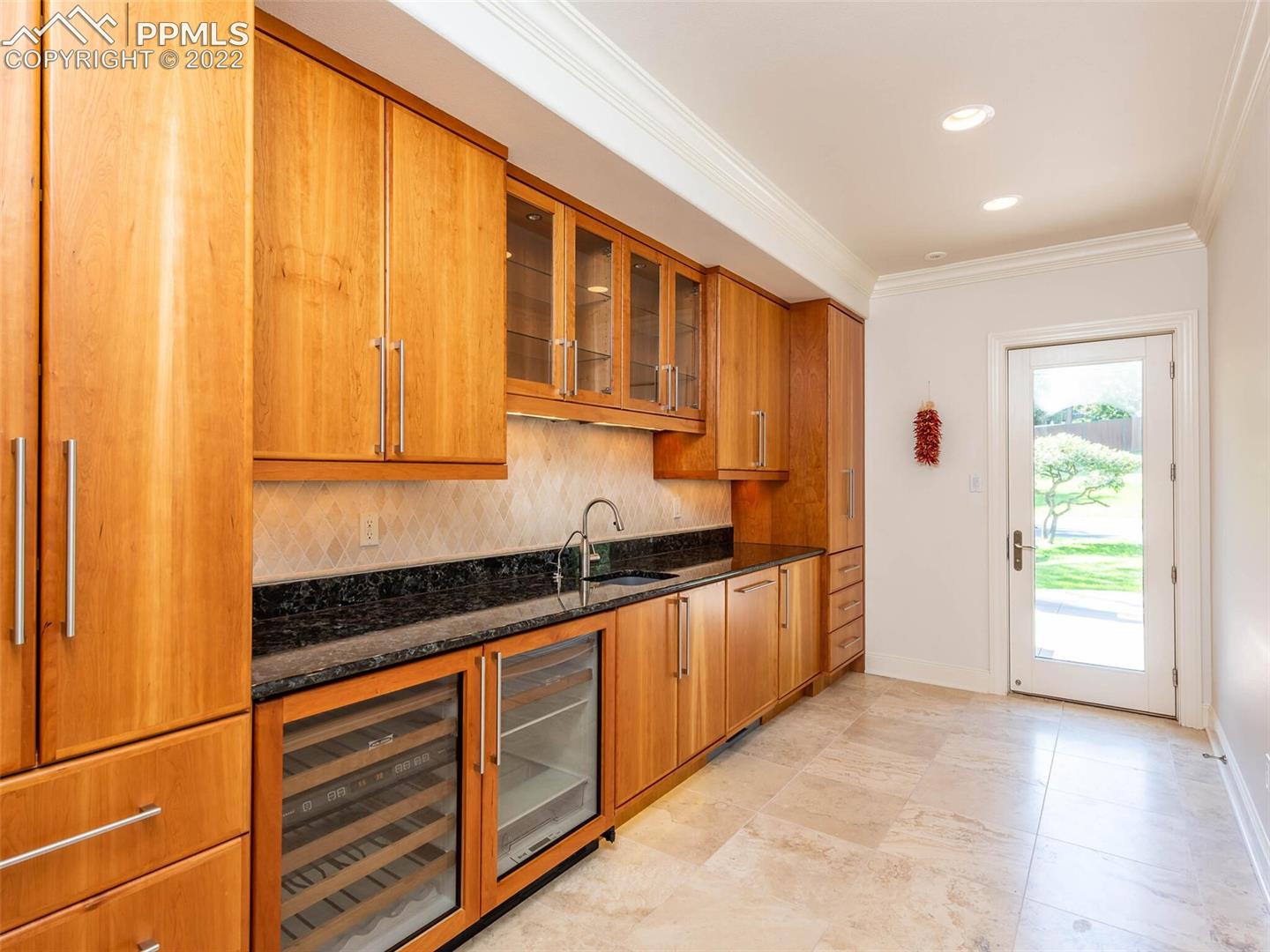 5 Alta Vista Road Colorado Springs, CO 80906 - Photo 14 of 49 Butlers pantry with wine refrigerator and Asko dishwasher