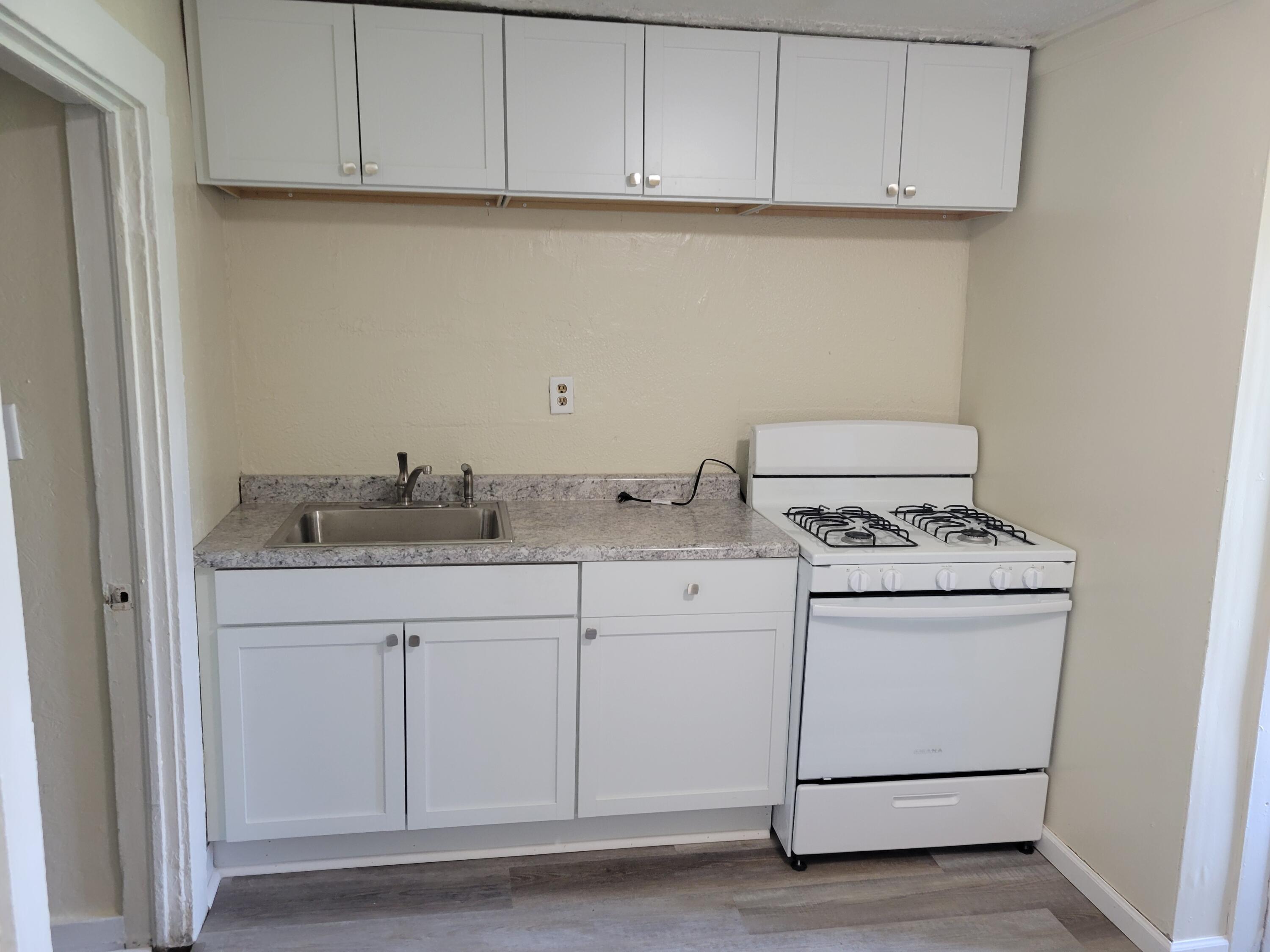 1028 South Memorial Drive Racine, WI 53403 - Photo 4 of 18 I Bedroom Kitchen