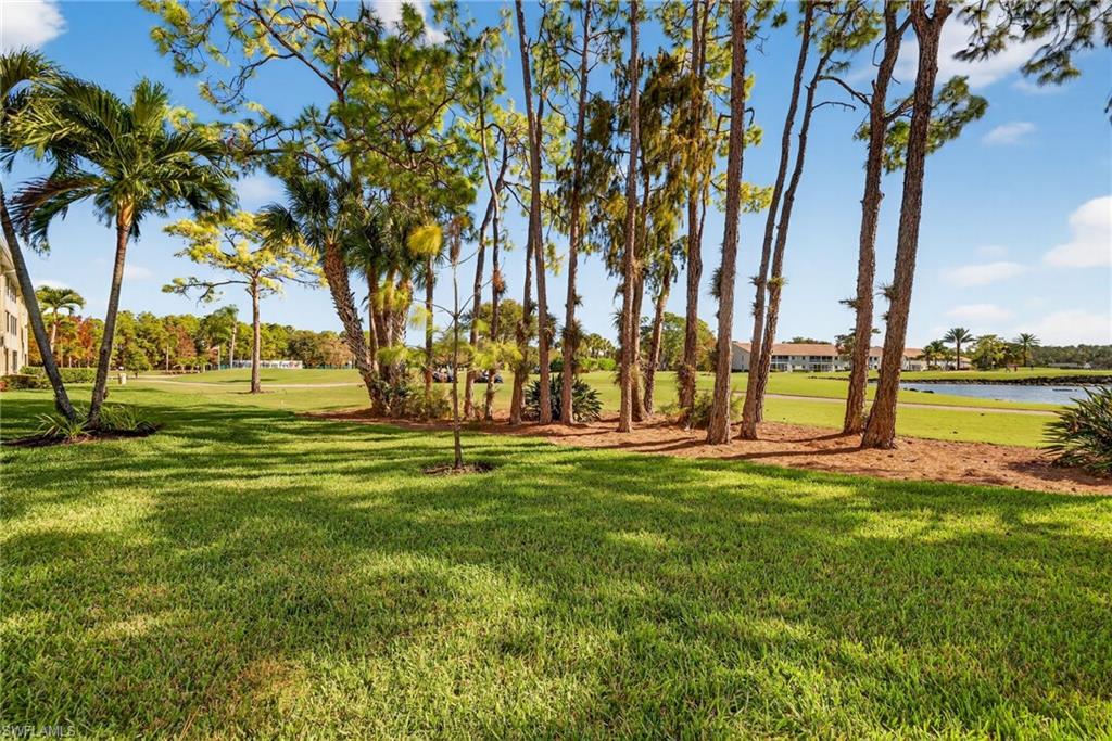 3665 Amberly Circle, Unit B101 Naples, FL 34112 - Photo 23 of 30 a view of a park