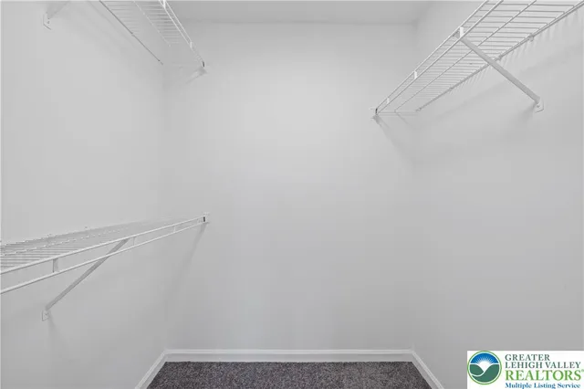 a view of small space with racks on the wall