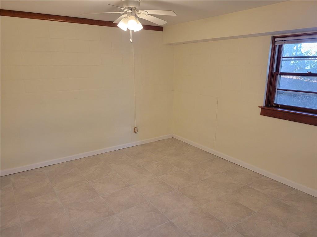 3009 Caldwell Road Northeast Brookhaven, GA 30319 - Photo 18 of 22 en empty room with a window