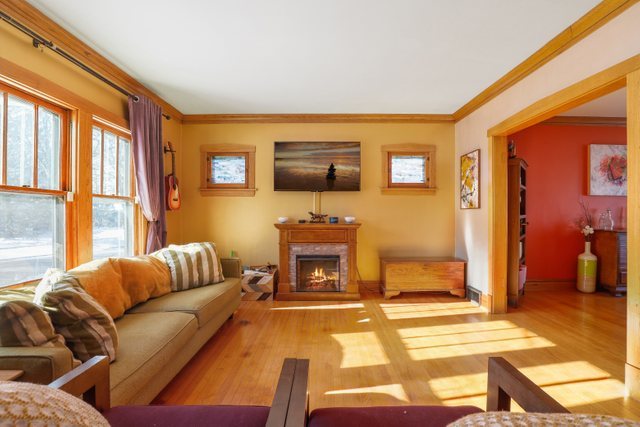 102 Northgate Road Riverside, IL 60546 - Photo 5 of 45 a living room with furniture and a flat screen tv
