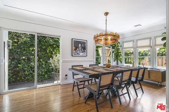 a kitchen with a refrigerator stove and sink