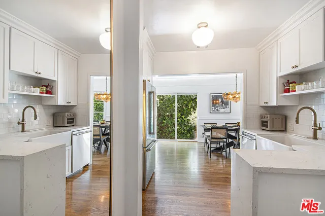 a bathroom with a toilet and a sink