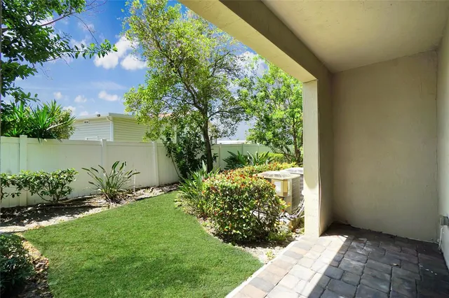 a view of a garden with a fountain