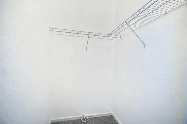 a view of small space with racks on the wall