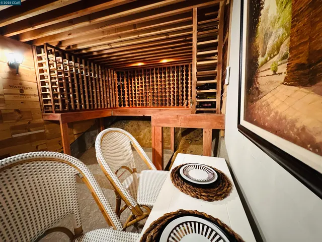 a view of a chair and table in the balcony