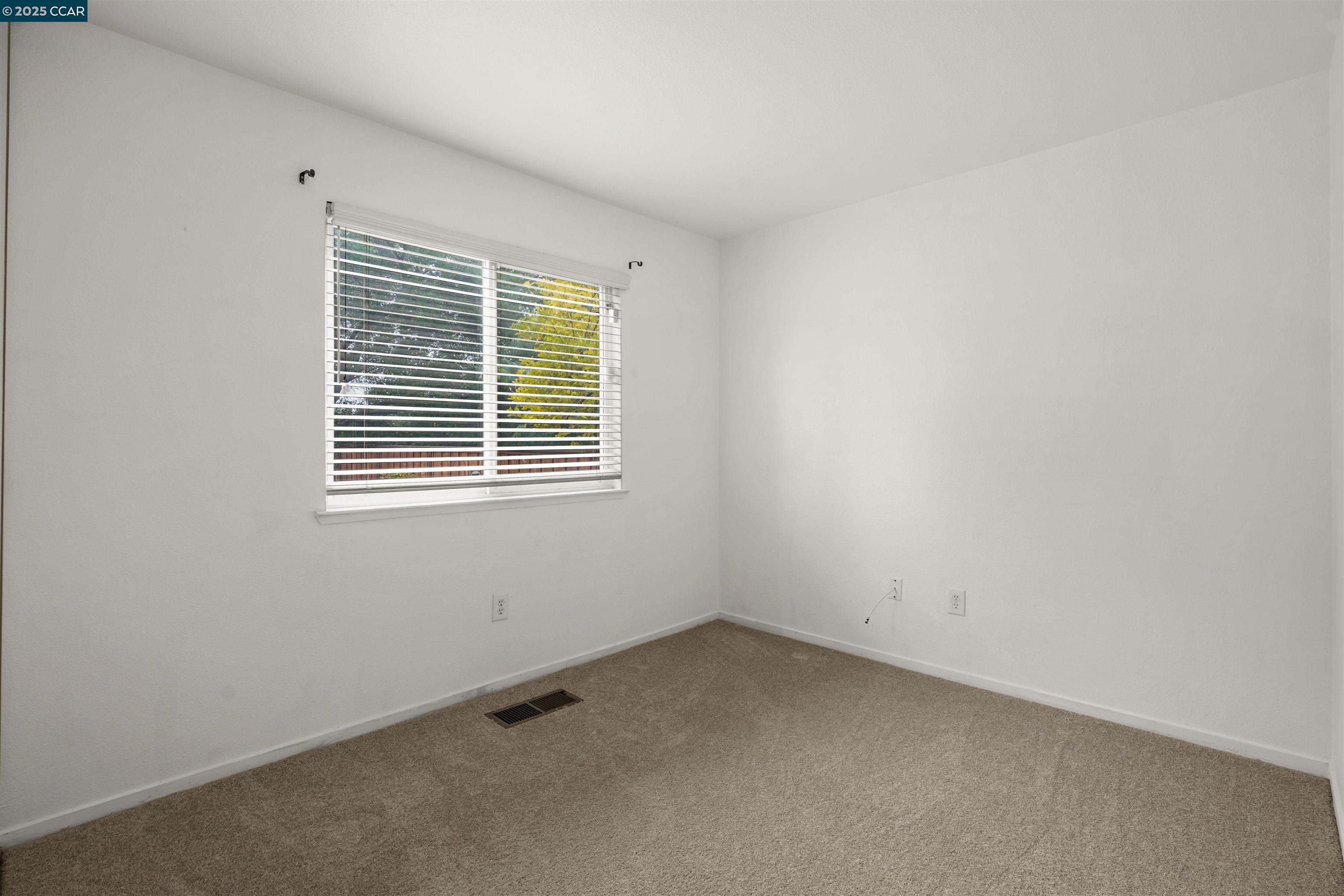 2063 Bluerock Court Concord, CA 94521 - Photo 19 of 38 an empty room with a window