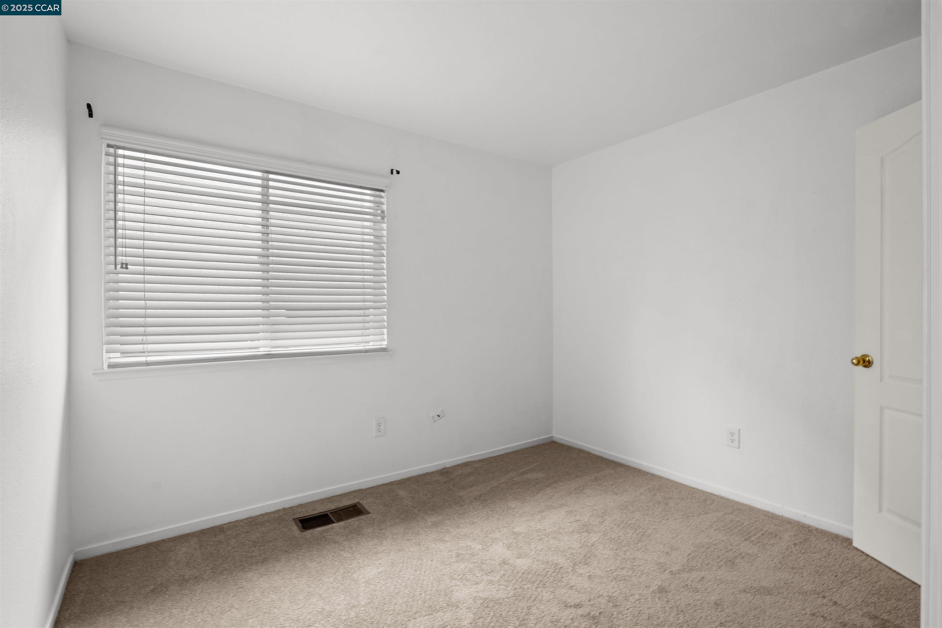 2063 Bluerock Court Concord, CA 94521 - Photo 23 of 38 an empty room with a window