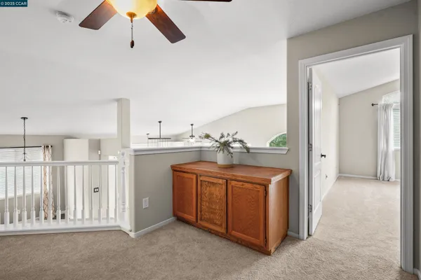 a view of a hallway with washer and dryer