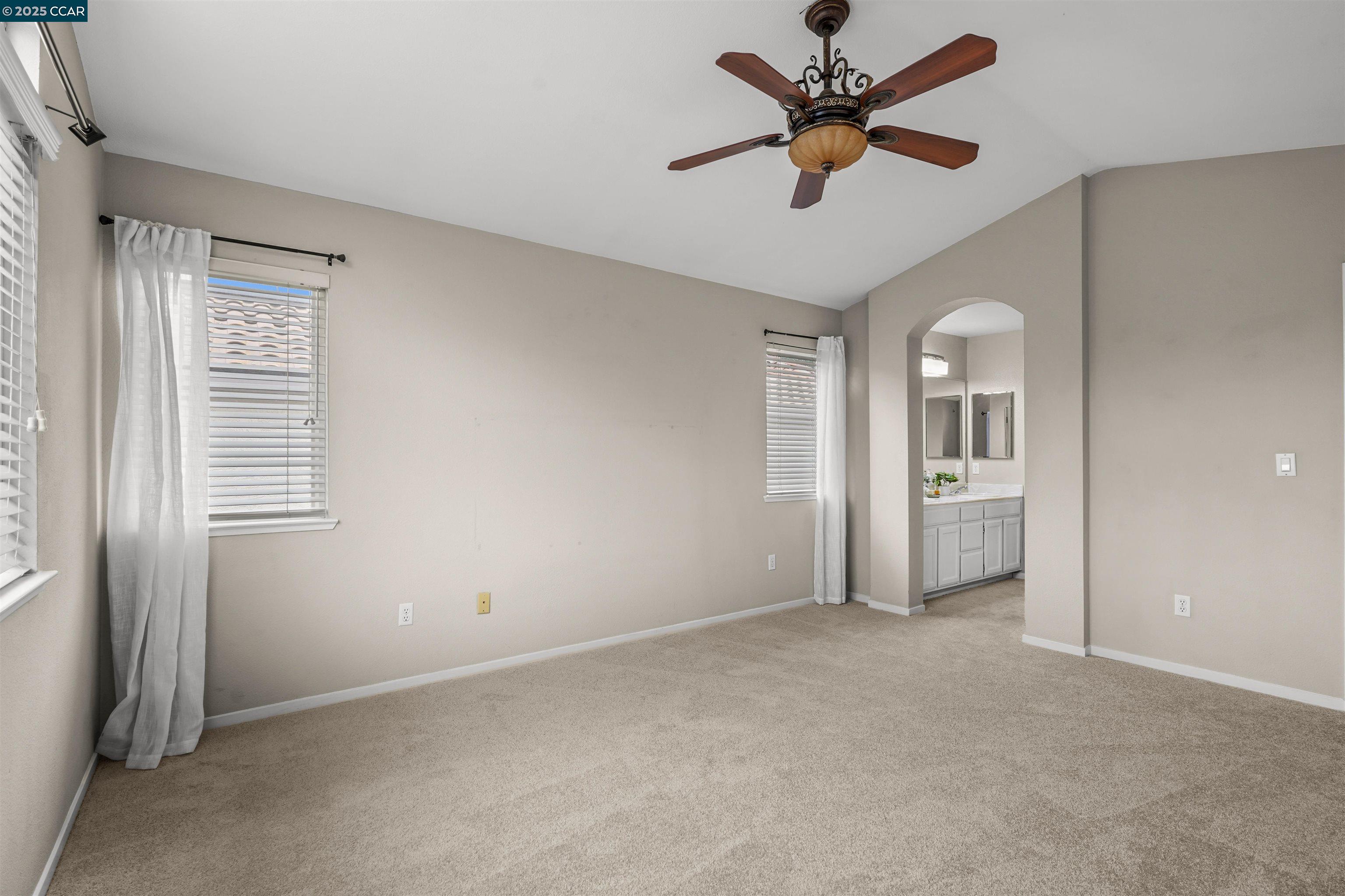 2063 Bluerock Court Concord, CA 94521 - Photo 29 of 38 a view of a livingroom with a ceiling fan a ceiling fan and a window