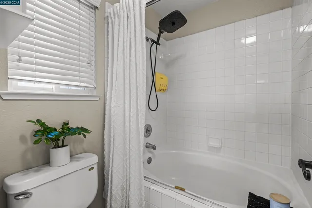 a bath room with a toilet