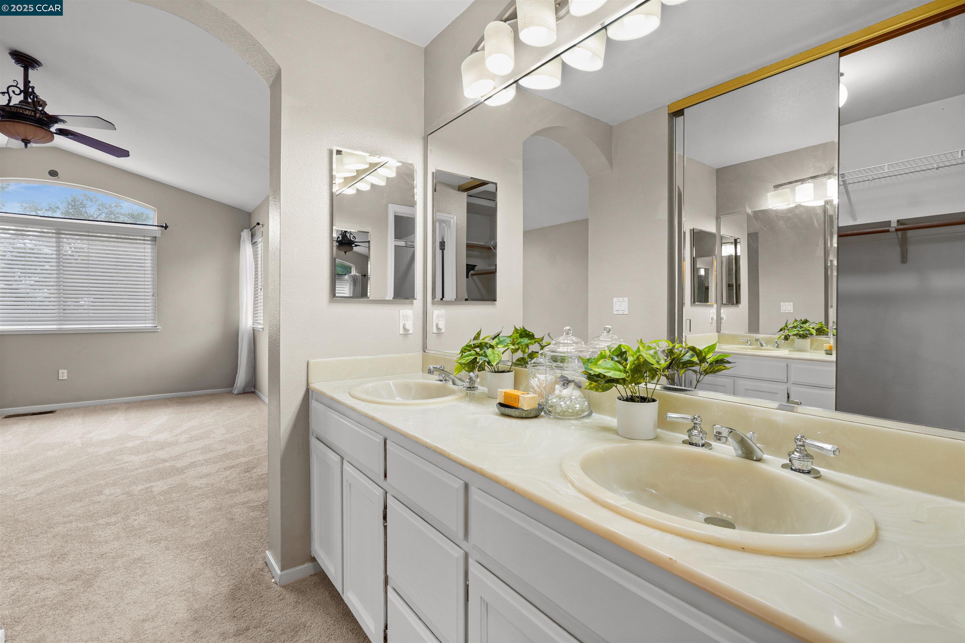 2063 Bluerock Court Concord, CA 94521 - Photo 33 of 38 a bathroom with a sink and a mirror