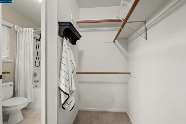 a view of a swimming pool with a lounge chair