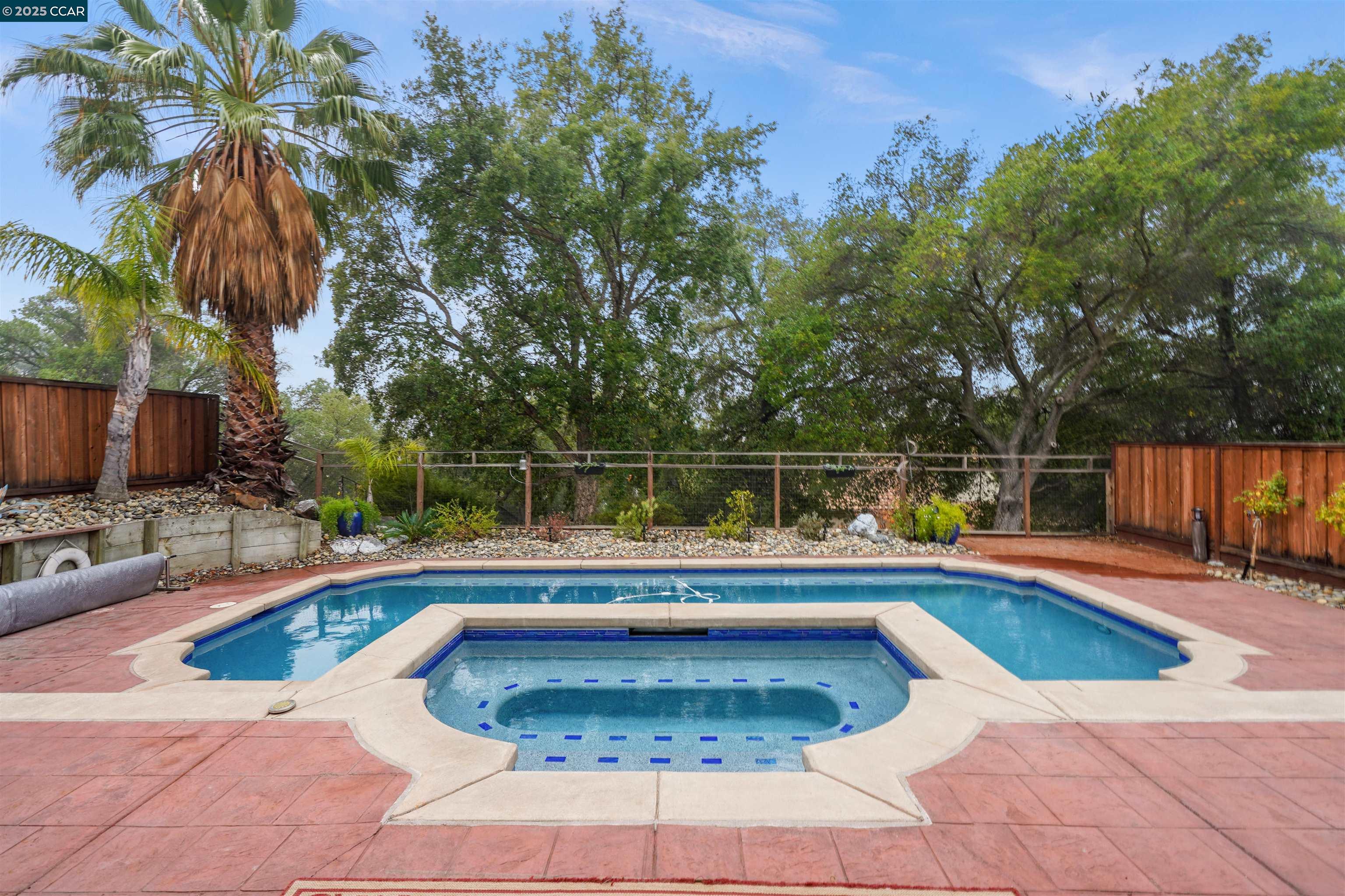 2063 Bluerock Court Concord, CA 94521 - Photo 35 of 38 a view of a swimming pool with a lounge chair