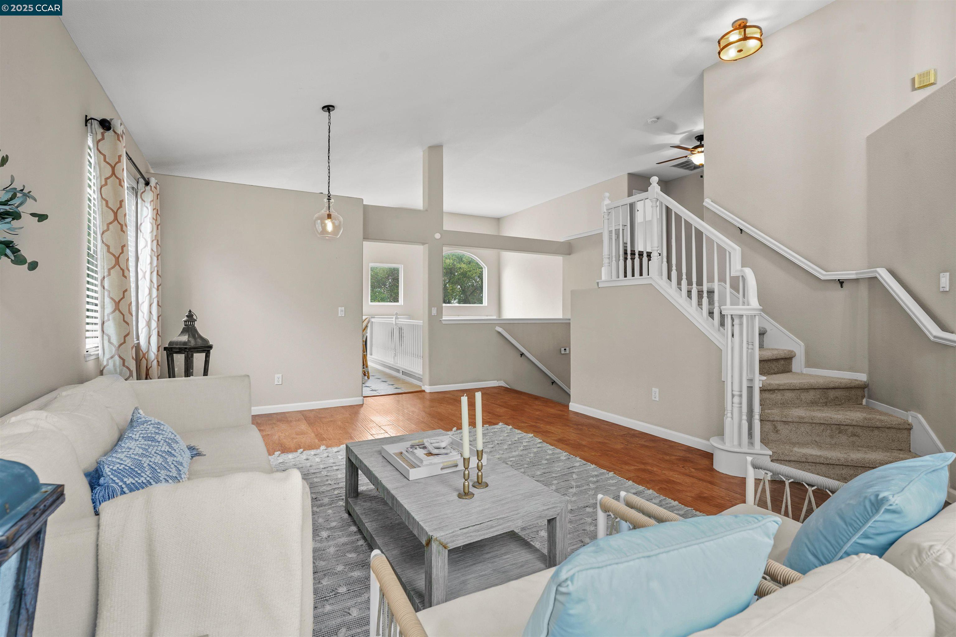 2063 Bluerock Court Concord, CA 94521 - Photo 6 of 38 a living room with furniture and a table