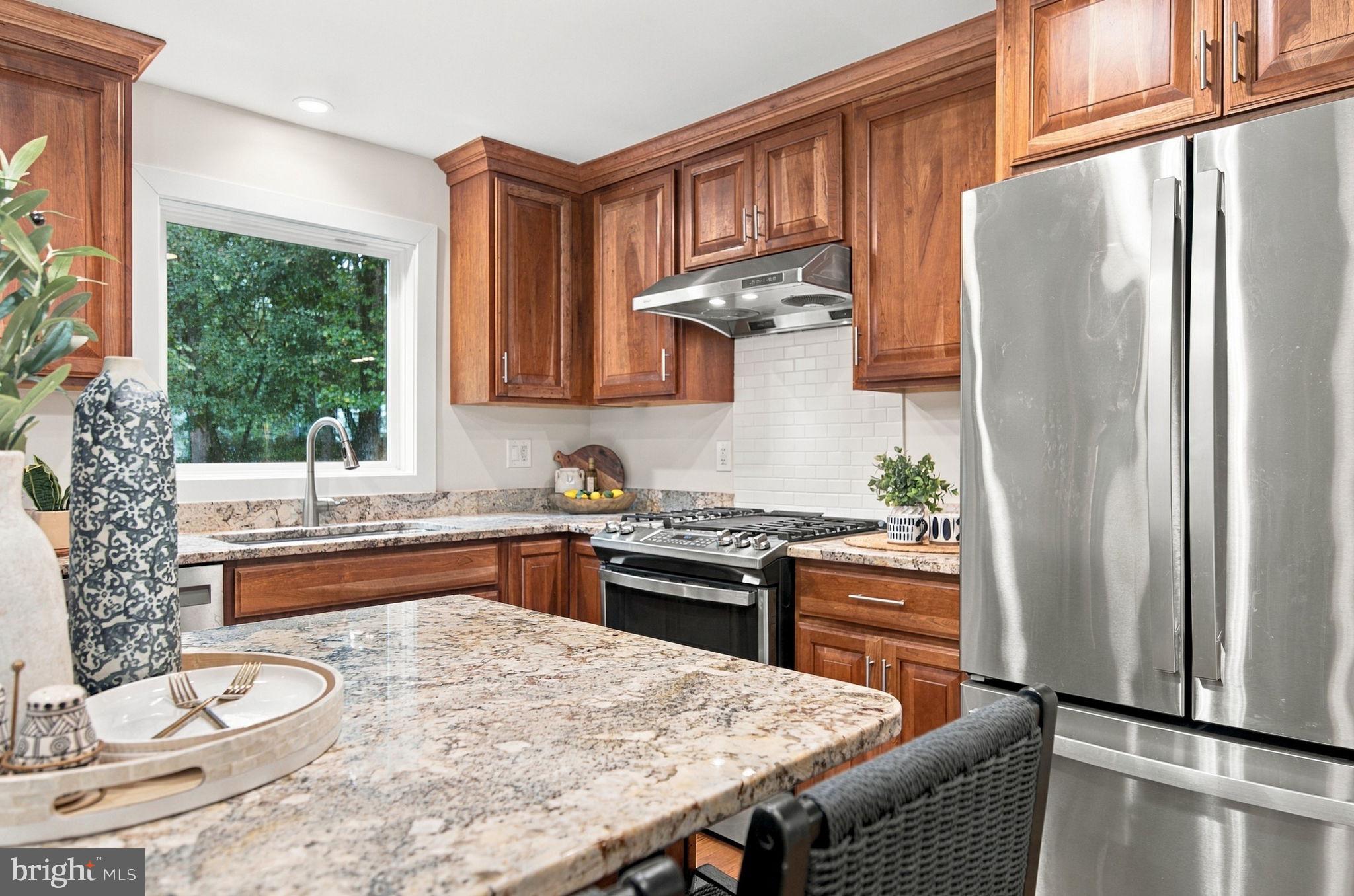 11231 Hunting Horn Lane Reston, VA 20191 - Photo 19 of 64 Stainless appliances and solid wood cabinets