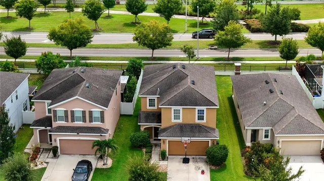 an aerial view of a house with a garden