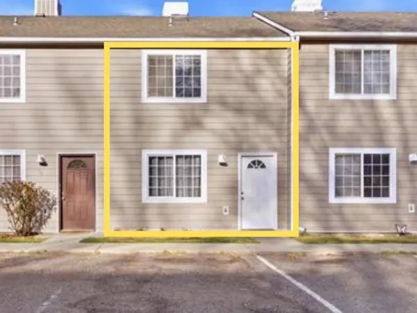 a front view of a house having yard