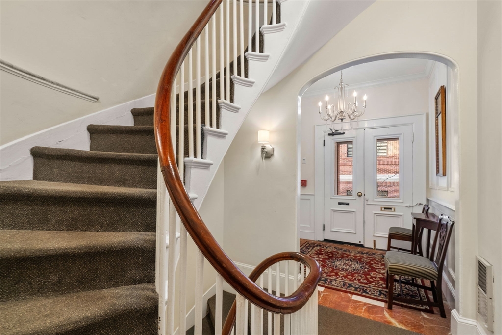 58 Temple Street, Unit 3 Boston, MA 02114 - Photo 14 of 17 a view of entryway and hall with wooden floor