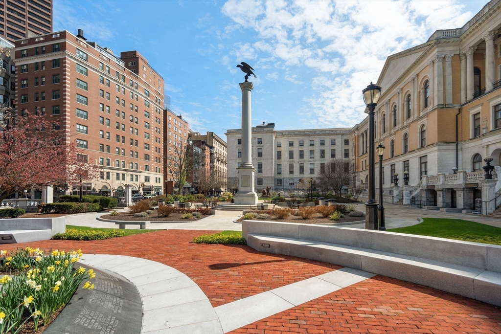 58 Temple Street, Unit 3 Boston, MA 02114 - Photo 16 of 17 a building outdoor space with lots of trees in the background