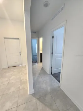 a view of a room with racks on the wall