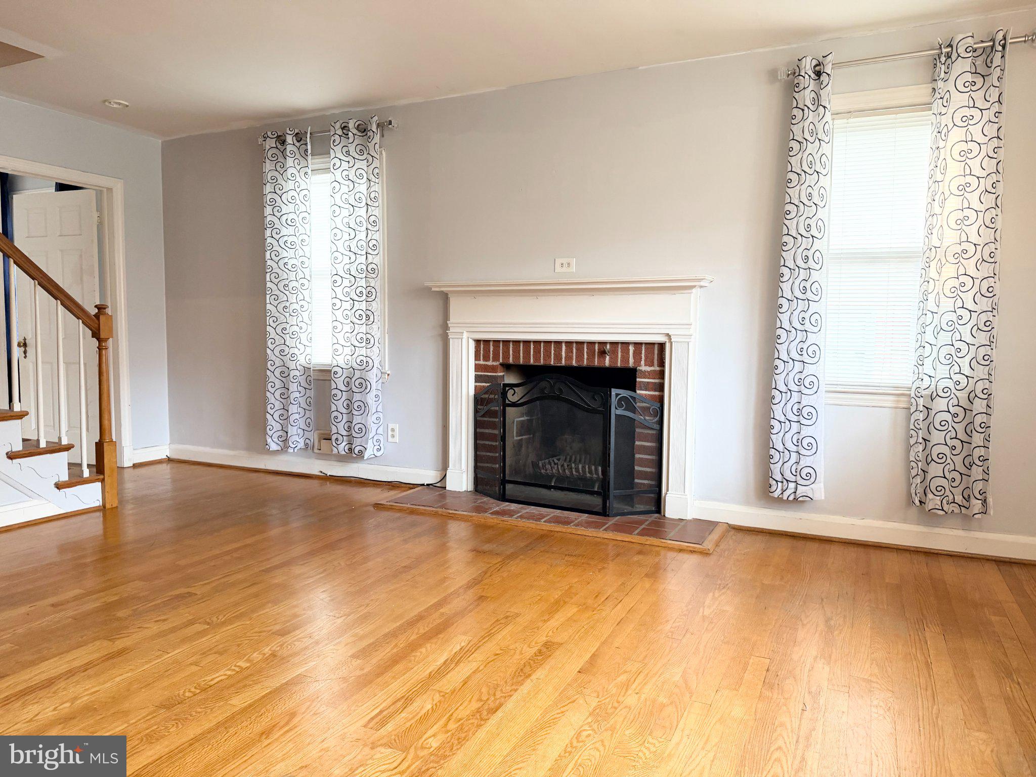 1615 Burnwood Road Baltimore, MD 21239 - Photo 8 of 83 Inviting space with a cozy fireplace.
