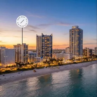 a view of a ocean with tall building