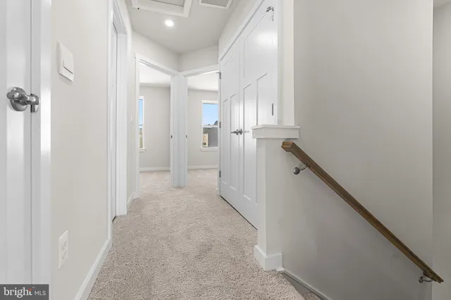 an empty room with closet area