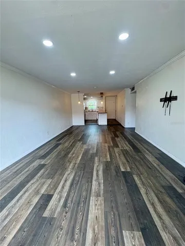 a kitchen with stainless steel appliances a sink and a stove