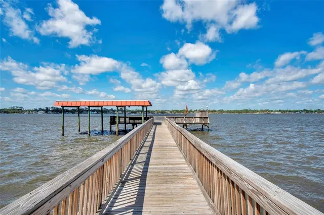 a view of a house with a swimming pool