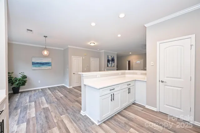 a spacious bathroom with a granite countertop sink